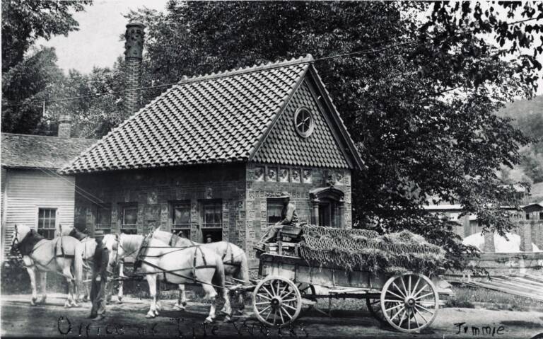 Office horses and wagon loaded with tile